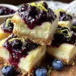 creamy lemon blueberry cheesecake bars - featured image