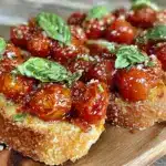 fresh cherry tomato bruschetta with basil - featured image