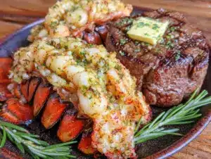garlic butter lobster tail with filet mignon - featured image